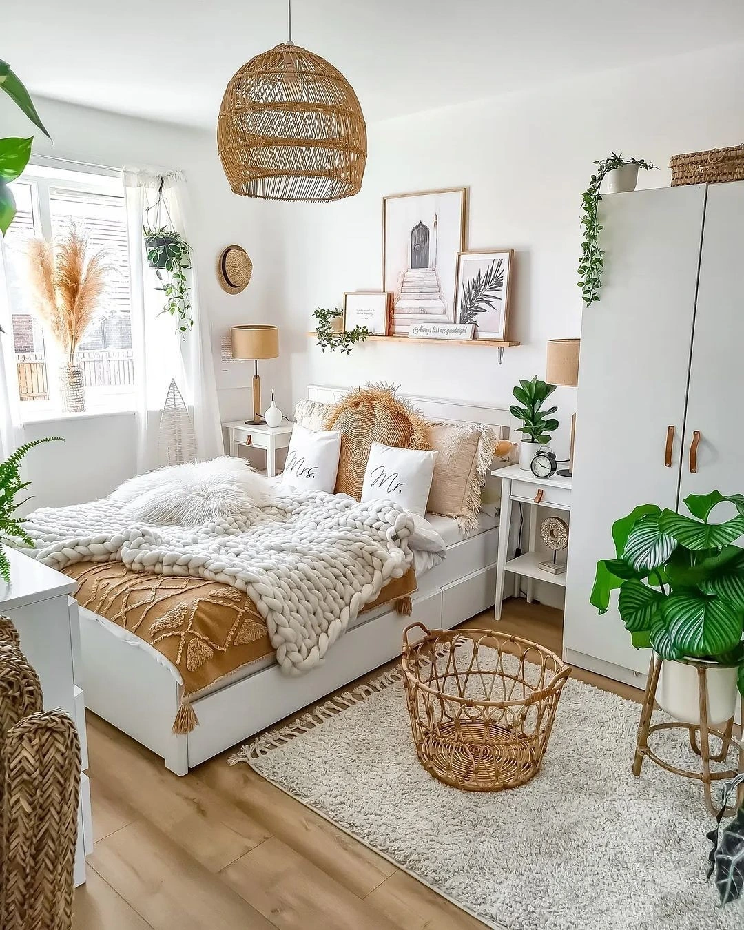 Boho Bedroom Ideas Bohemian Cozy: Woven chandelier over white bed.