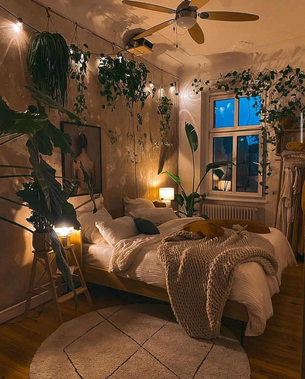 Boho Bedroom Ideas Bohemian Cozy: Bedroom with string lights and hanging vines.