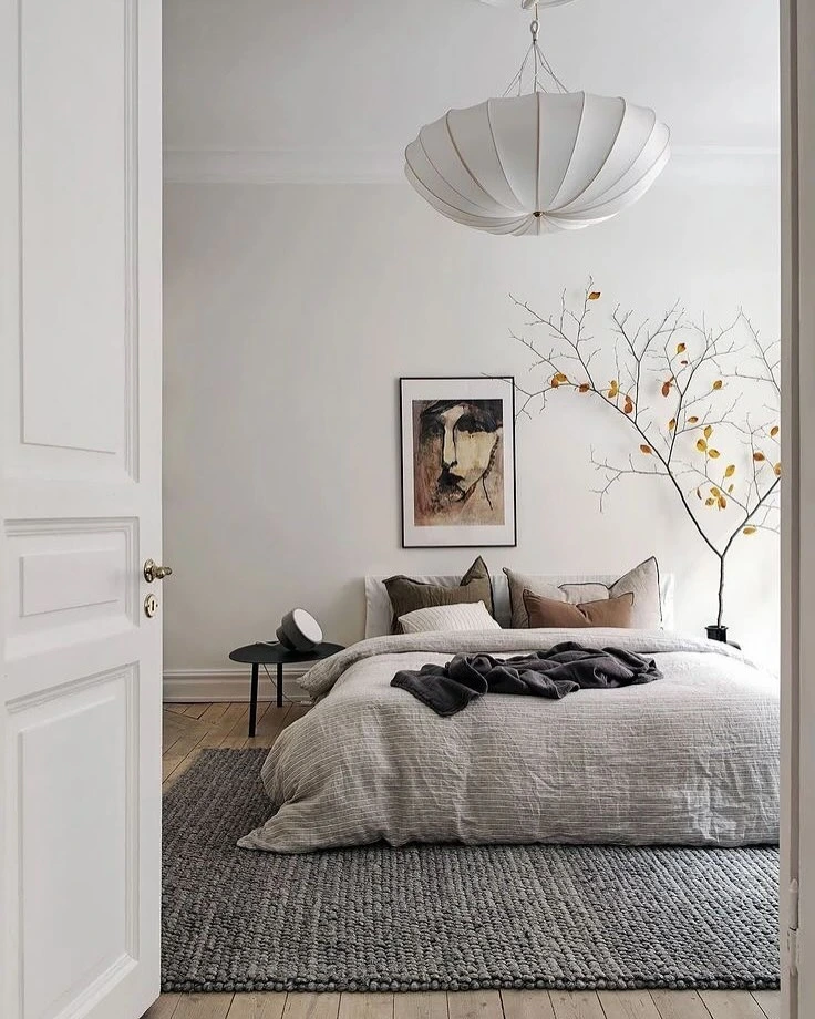 Simple Bedroom Ideas for Small Rooms Minimalist: White room with tree branch art.