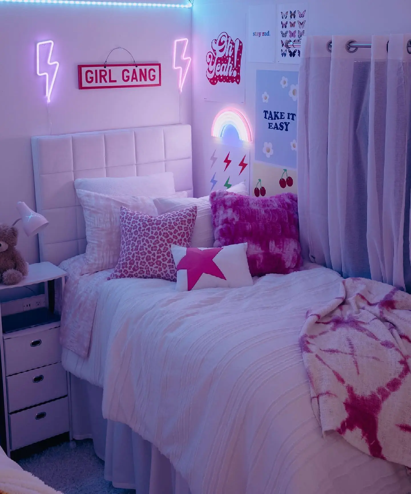 Y2K Bedroom Ideas for Teenage Girls: Room with pink neon "Girl Gang" sign and soft bed