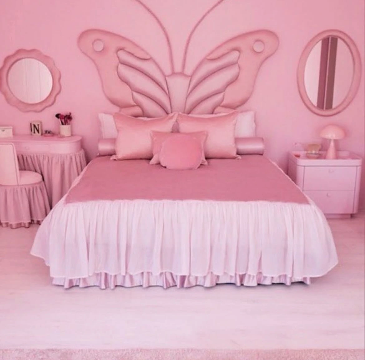 Y2K Bedroom Ideas for Teenage Girls: All-pink butterfly themed bed with matching vanity.  