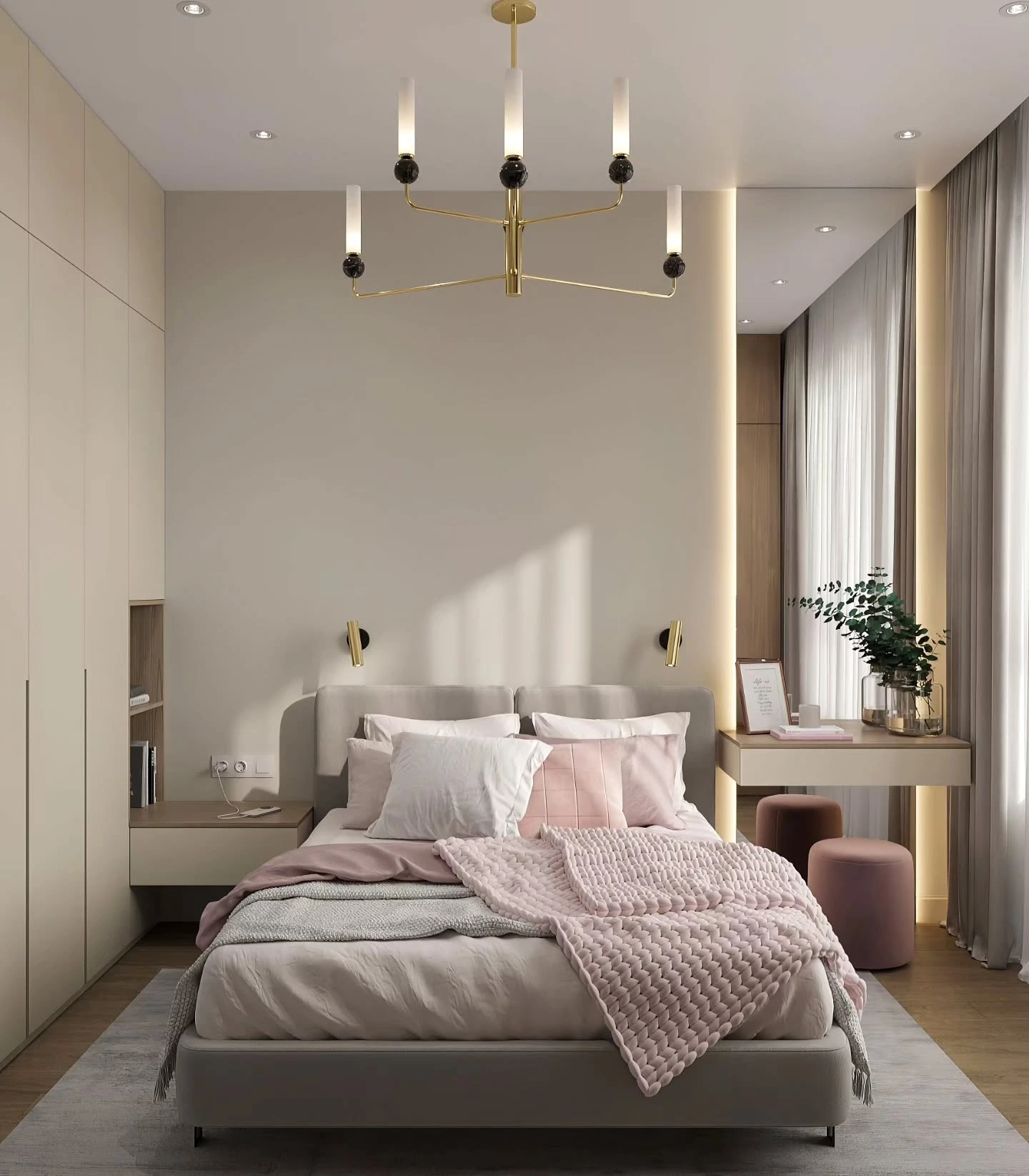 Modern bedroom with a gray bed, soft pink pillows, and a gold chandelier.