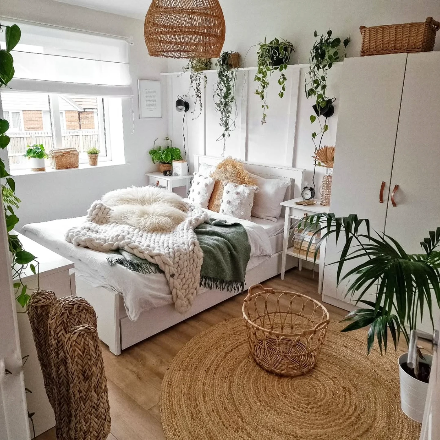 Boho Bedroom Ideas for Teens: Green plants and a woven light.