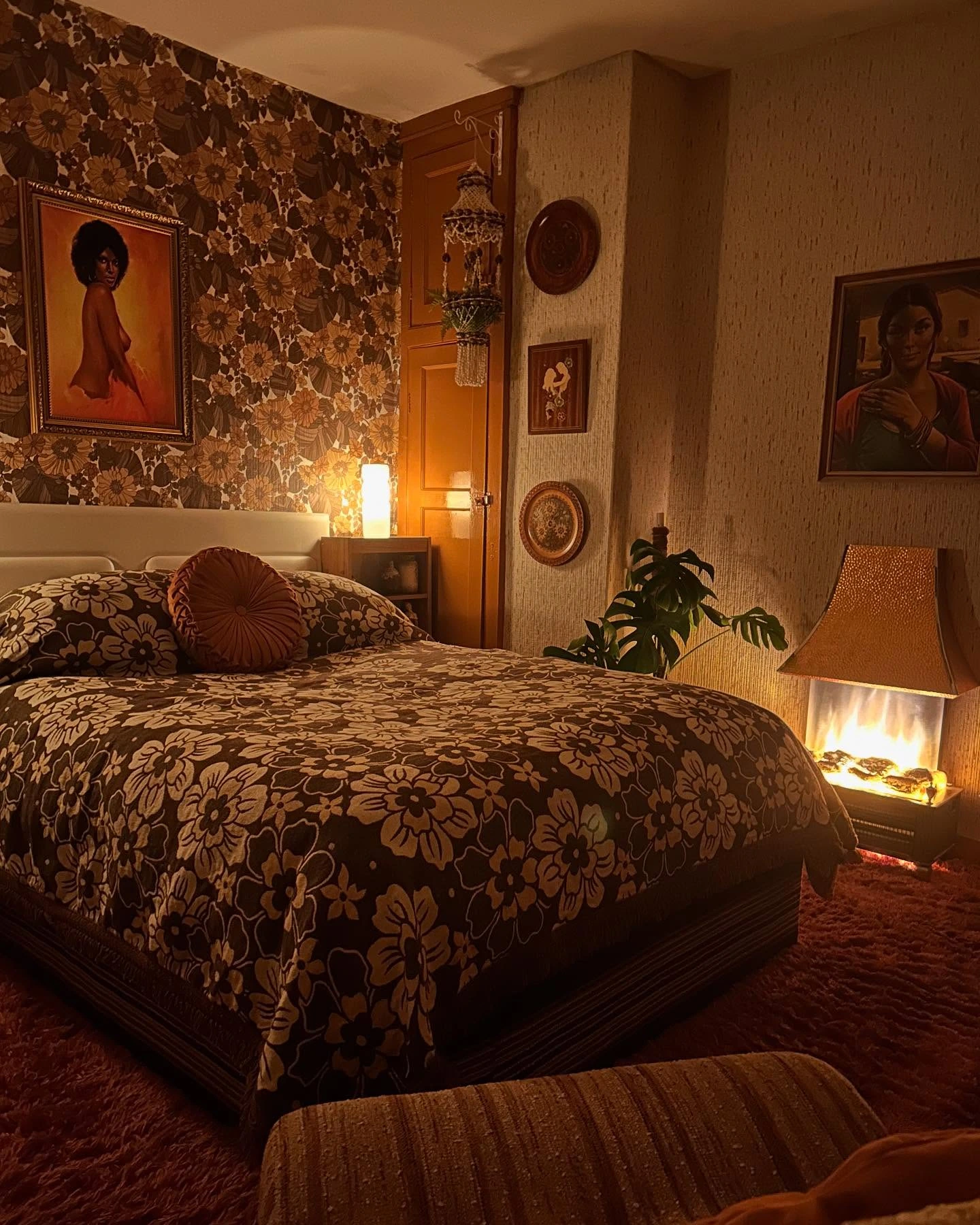 Boho Bedroom Ideas for Teens: Dark floral wallpaper and a shag rug.