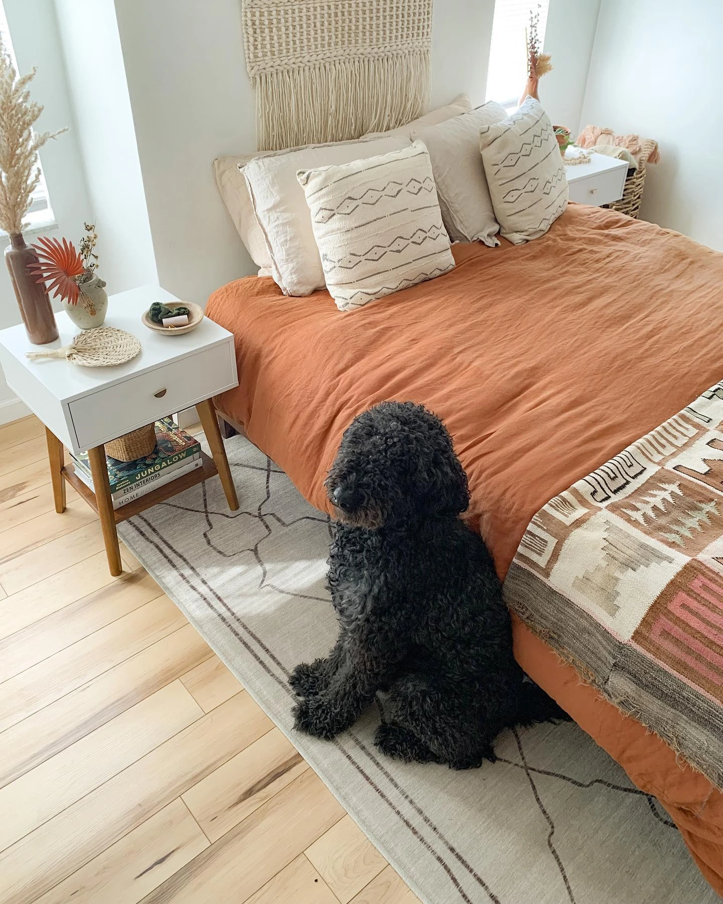 Boho Bedroom Ideas for Teens: A bed with terracotta bedding.
