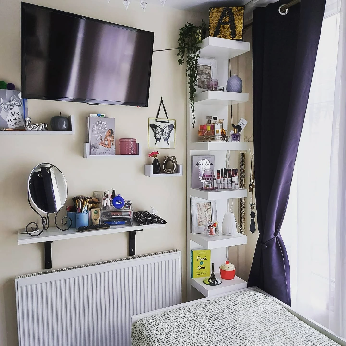 Bohemian bedroom with plants and string lights.