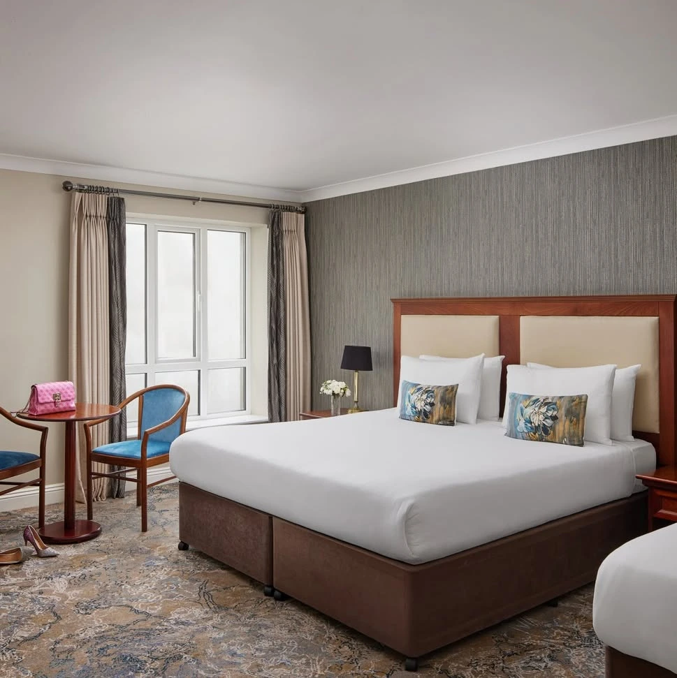 Symmetrical bedroom with matching nightstands.