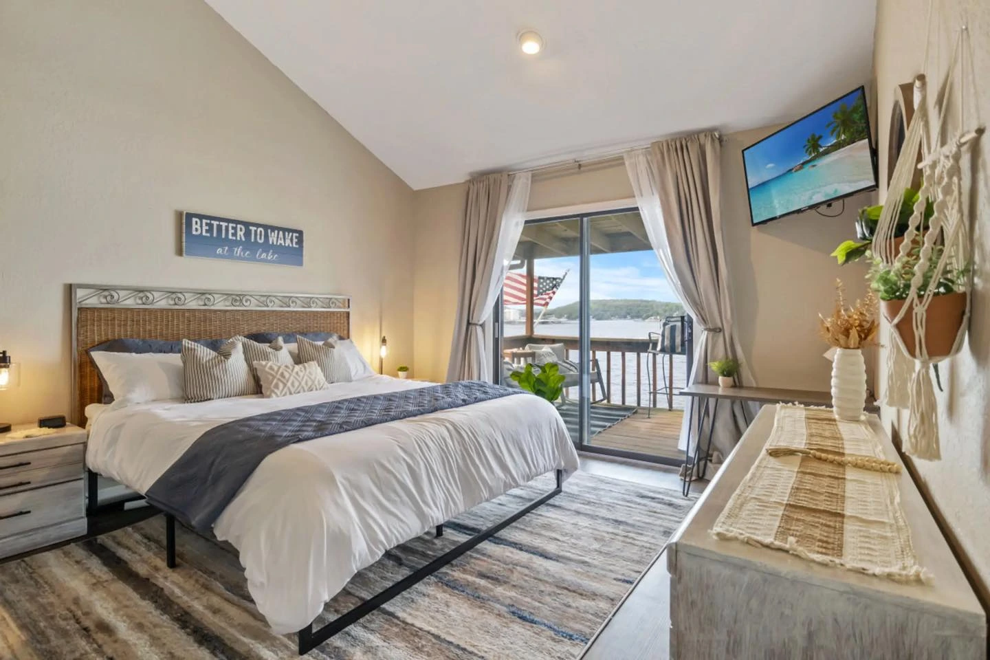 Bright bedroom with woven headboard and natural light.