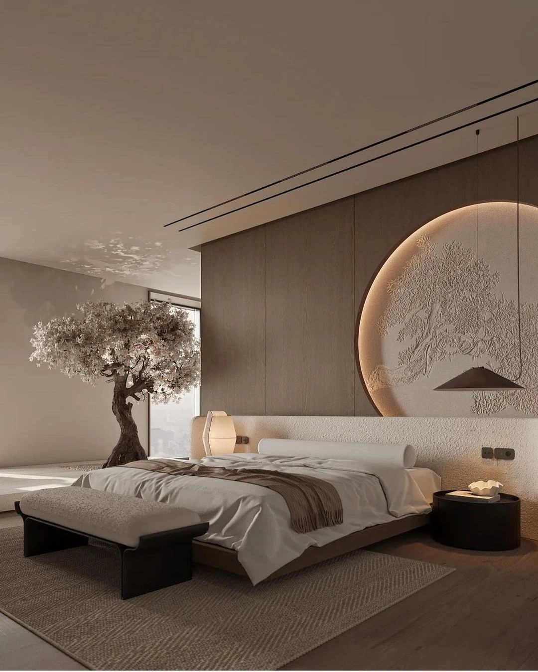 Zen bedroom with glowing circular art and plant.