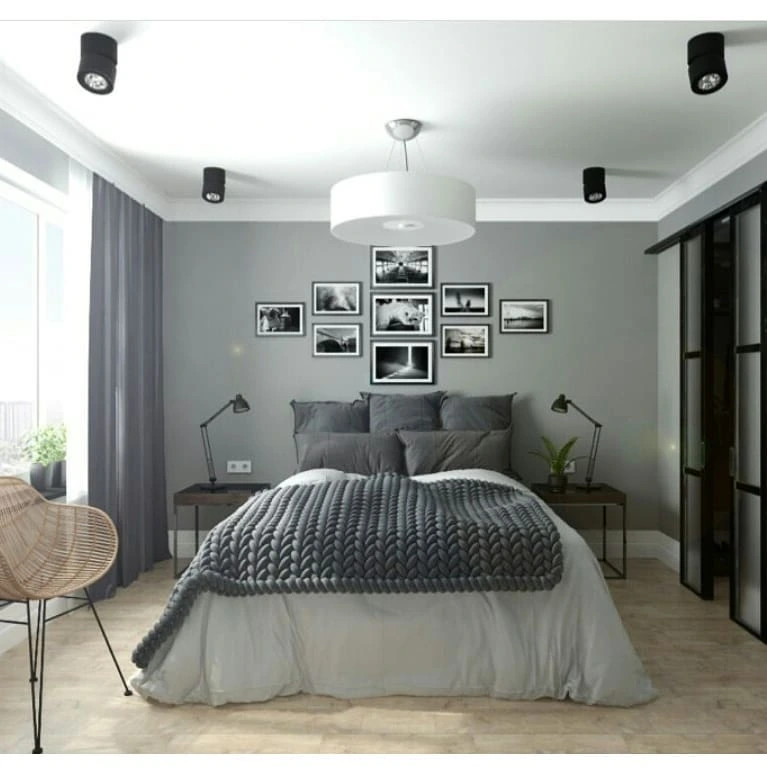 Gray bedroom with photo gallery wall