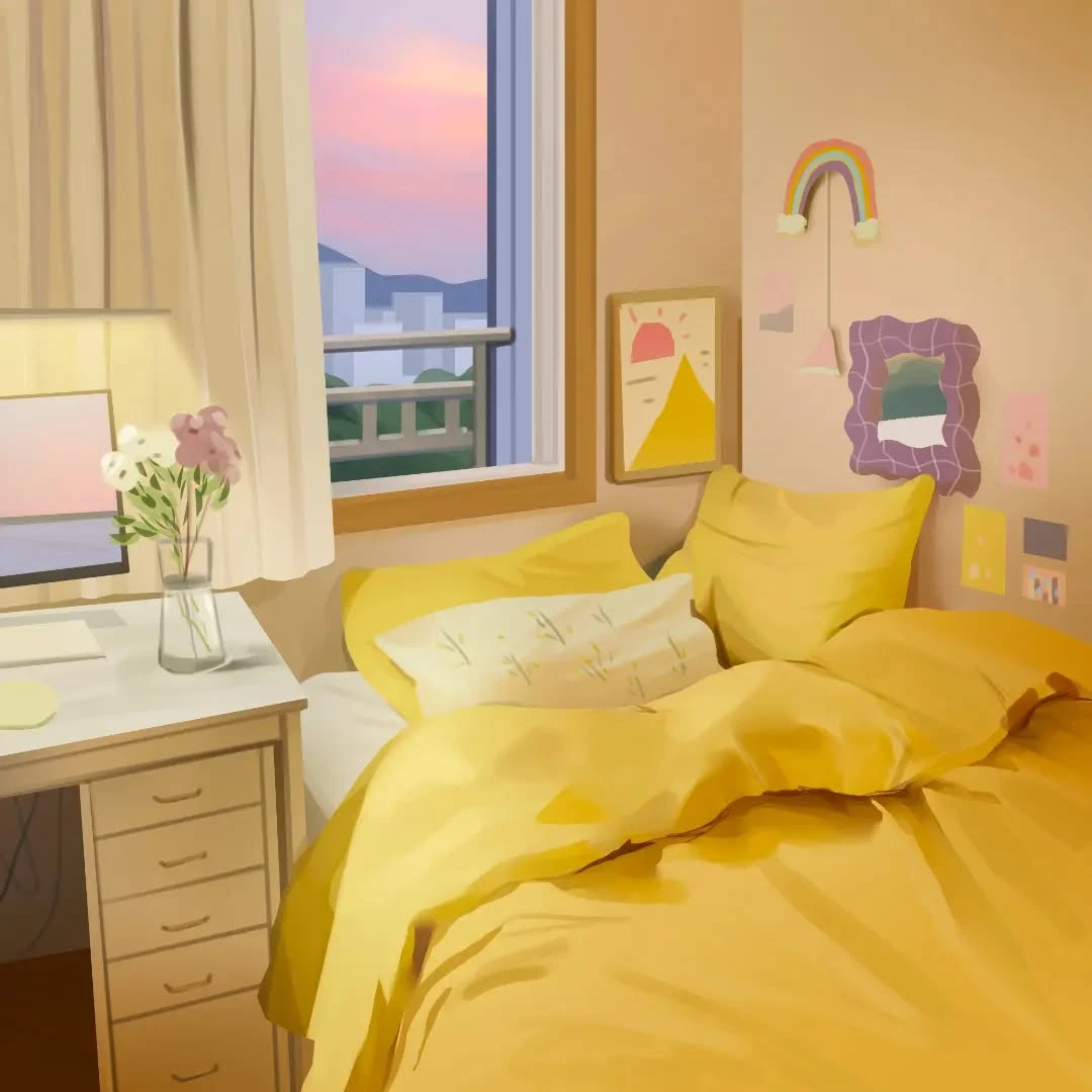 Bed with a bright yellow comforter.  