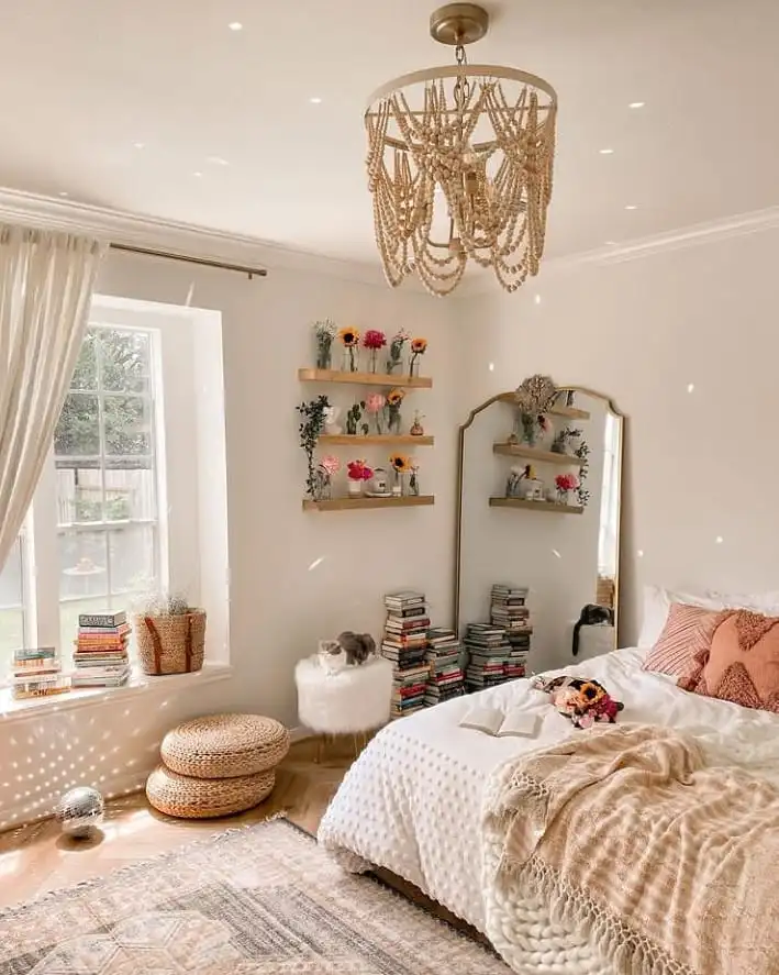 Cozy corner with books and a hanging mirror.  